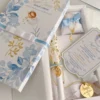 set_vela_pañuelo_denario_tarjeta_celeste